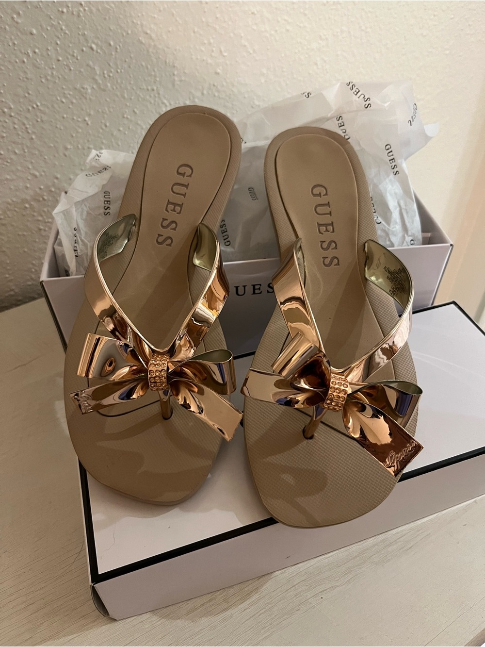Guess Women's Tan Sandals with Rose Gold Bow Size: 8